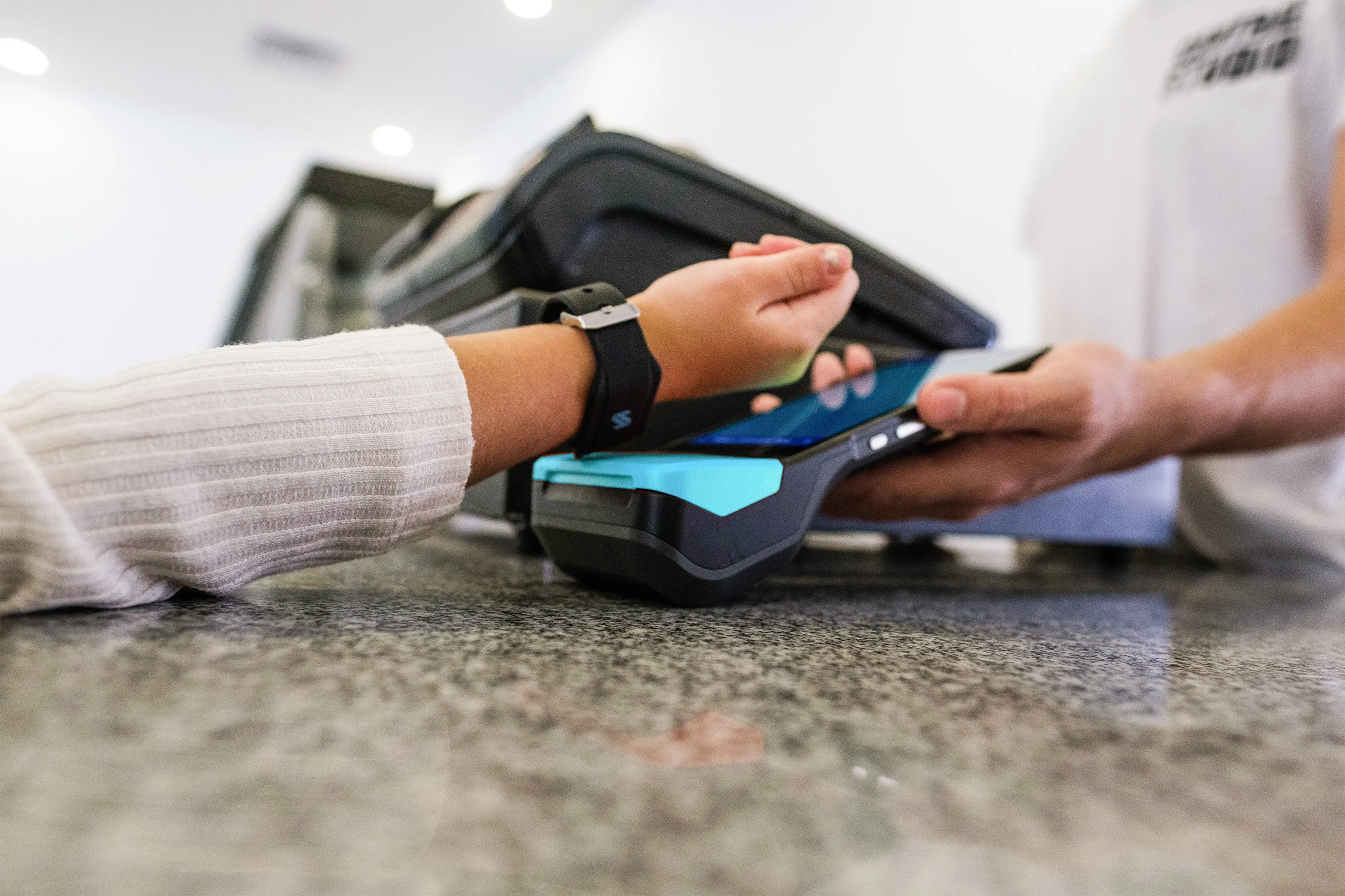 Student tapping wristband to pay